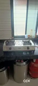 2 burner Surya gas stove stainless steel body in excellent condition.