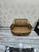 Seven seater sofa with wooden top glass table  in very good condition
