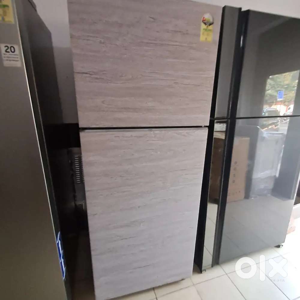 Samsung 450 litre double door digital inverter wooden finish unused.