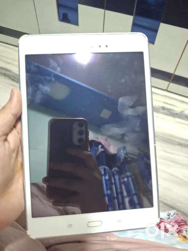 The product shown is a Samsung Galaxy Tab A 9.7 tablet.