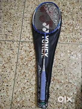 YONEX ZR 100 LIGHT Blue Strung Badminton Racket inclusive of cover.