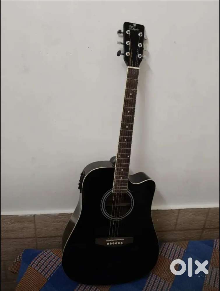 Pluto semi acoustic brand new guitar with equaliser 5 months old only