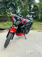 TVS Raider split seat wicked red