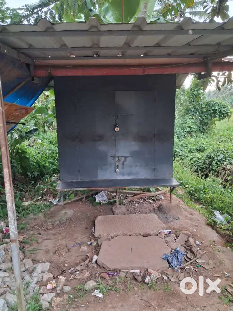 Metal fabricated structure useful as shop