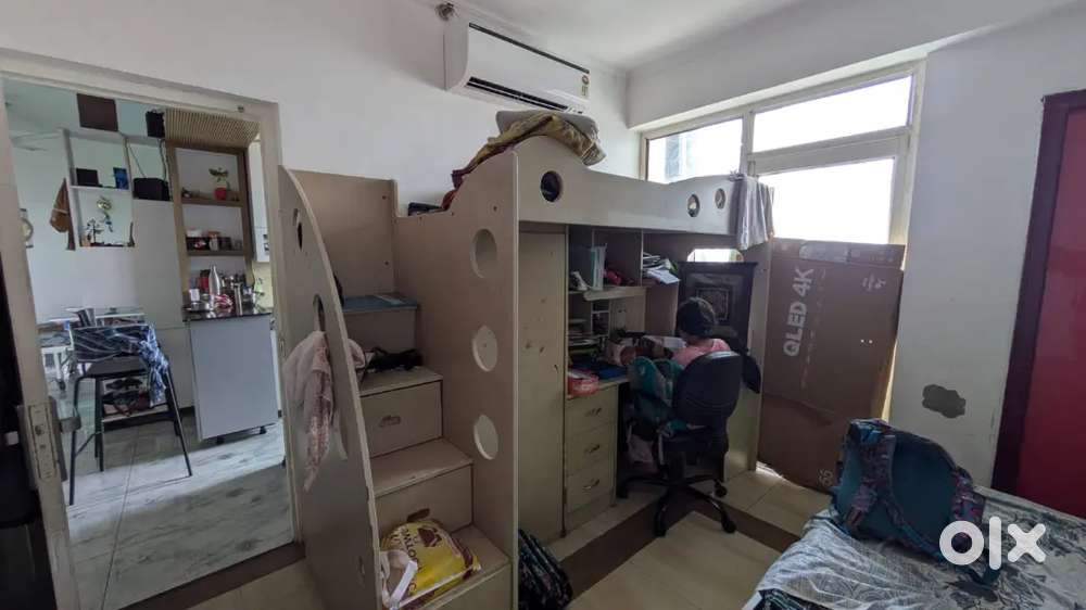 Bunk bed with storage and study table