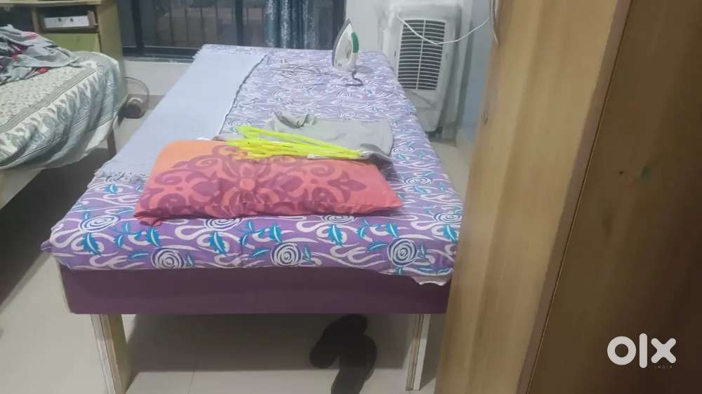 Bed and folding table