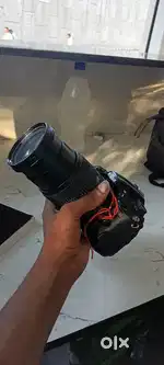 Nikon D7000 with 18-140 mm lens  fix Price