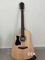 Left hand Ibanez electro acoustic guitar with Daddario bright strings