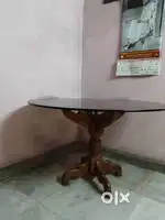 Round  glass top on shegun wooden stand