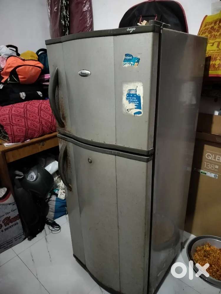 Refrigerator in best condition silver colour whirlpool