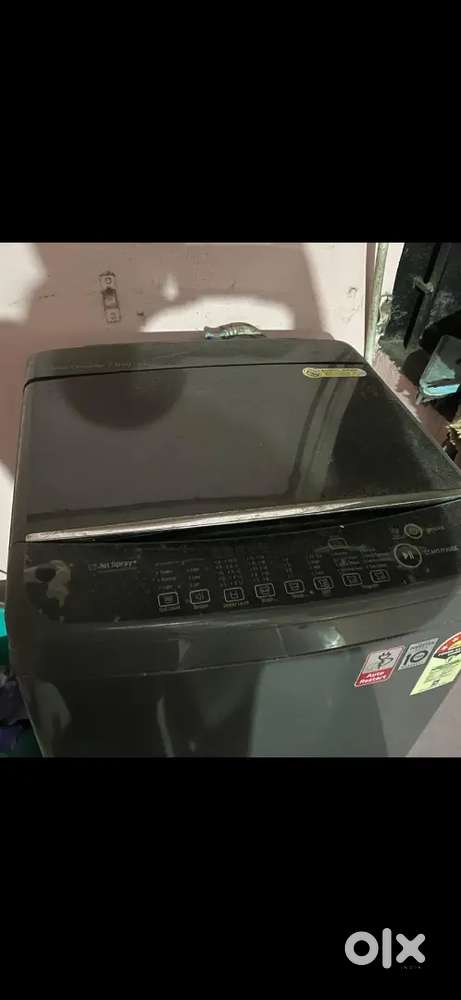 LG washing machine 5 star top load, 7kg load capacity.