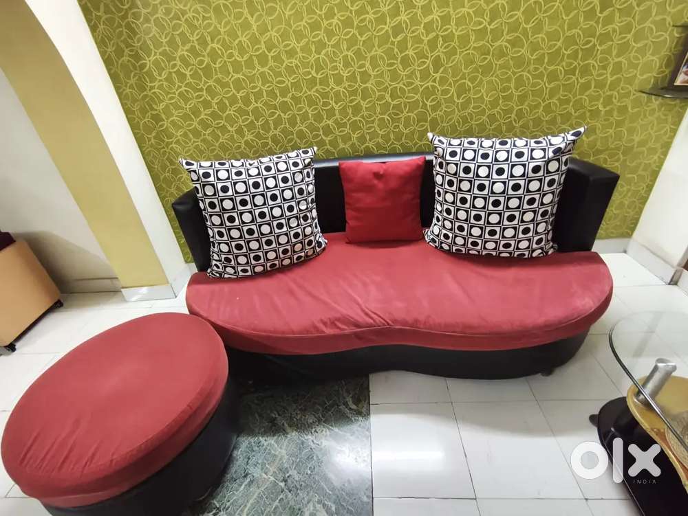 Three seater sofa with puff & center table.
