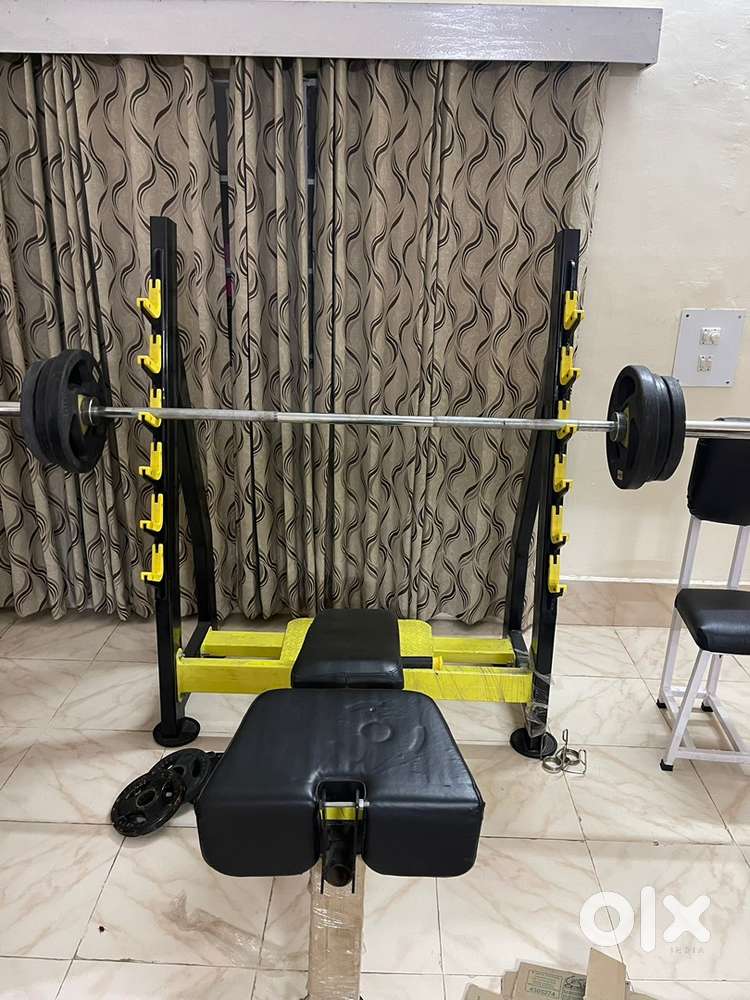 Dumbbells with rack and adjustable chest bench with rods and weights
