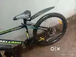 The cycle is in very good condition. It is little green in colour
