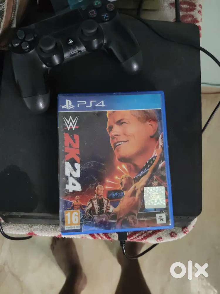 PS4 Slim Jet black 500gb and WWE2K24 game cd