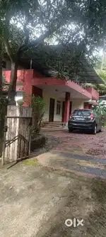 Plot with house for sale