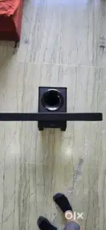 Sound bar with woofer