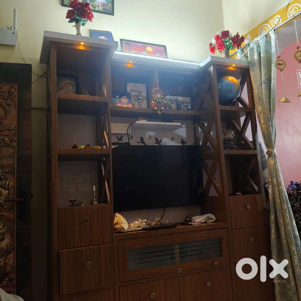 T v stand with book self