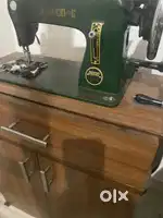Sewing machine with wooden stand