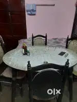 Wooden Dinning Table(oval) with 4 designed  Chairs