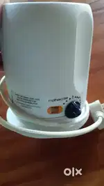 Mothercare Bottle warmer.