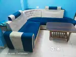 6 seater Sofa with Cover, pillows, and tea table in new condition
