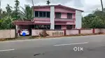 Property with house, near MC Road for sale in Pulluvazhi