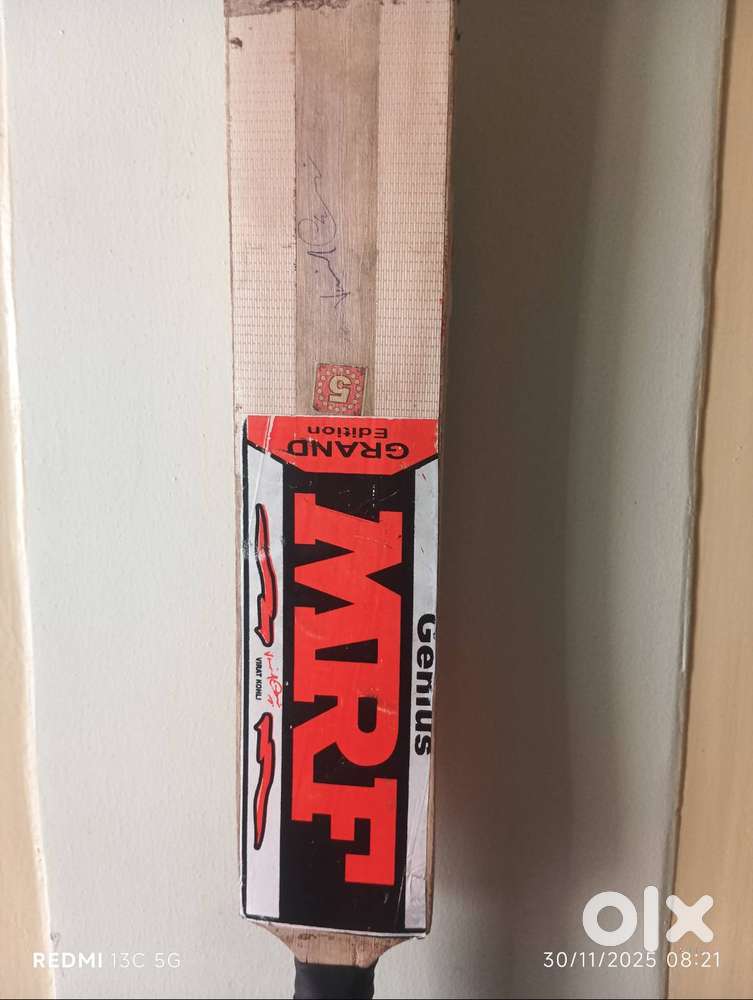 Having a signature of virat kohli on a bat