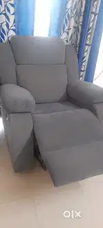 Recliner sofa chair and TV set and centre table