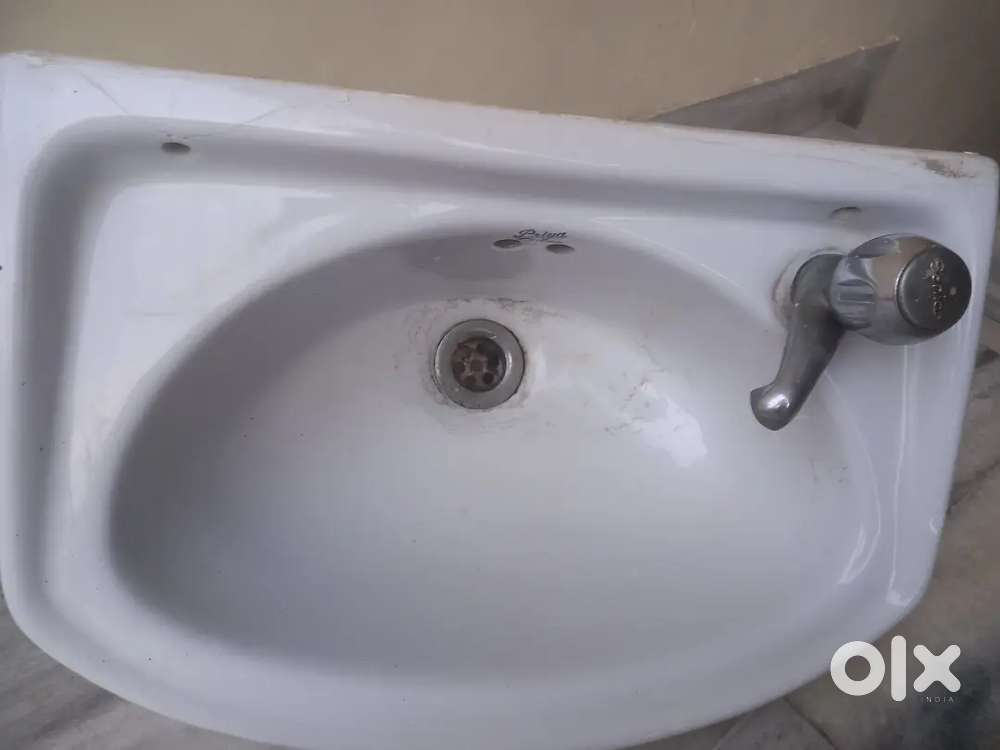 TWO WASH BASINS WITH TAPS