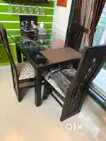 Very minimum 1 year old Dining Tablewith good condition