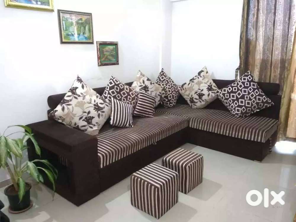 5 seater Sofa cum bed with adjustable neck rest, cushions & puffy