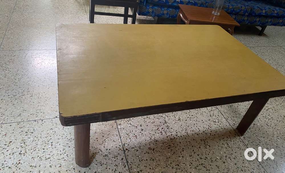 A big wooden centre table