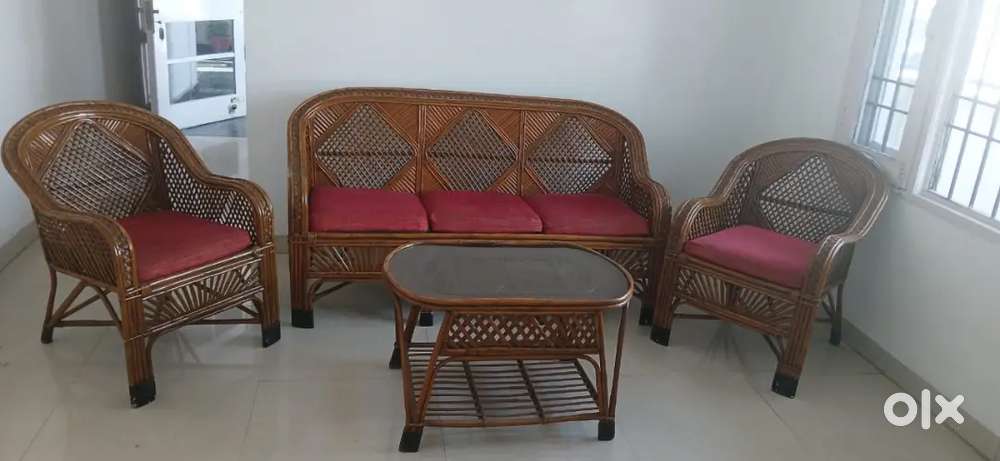 Five seater cane sofa with centre table