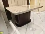 Dining table with marble top and 4 cushioned chairs