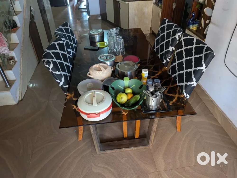 we are selling a 2 year old upto 6 seater dining table,4 seater chair