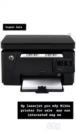 2 printers urgent sale canon colour printer hp laserjet B/W