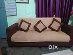 Sofa with all three pillow.