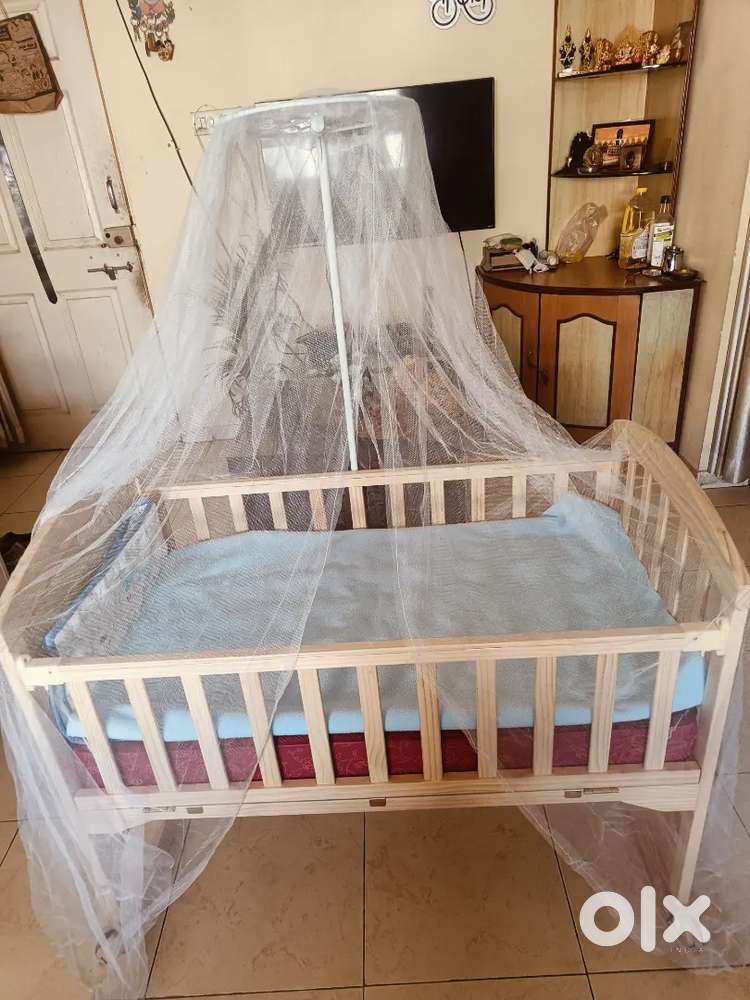Babyhug 4 in 1 cradle along with bed mattress