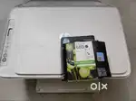 HP deskjet printer with new unused cartridge.