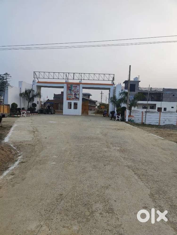 356 gaj ka corner ka  plot hai Neori mein Maa Pitambara Society mein