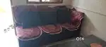 L shaped sofa with two stools