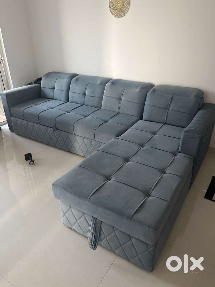 6 month old 5 seater sofa cum bedwith lounger in sky blue color