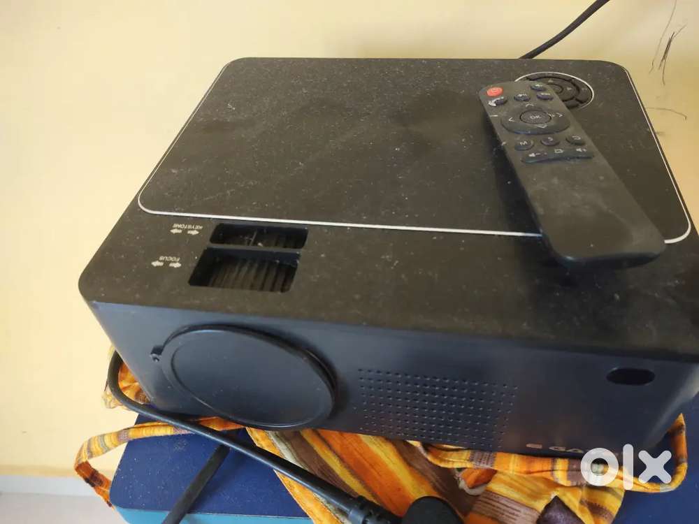Projector and wall screen