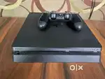 PS4 slim 1 TB with 2 controllers and 3 Games Discs