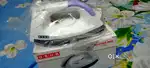 Brand new electric iron