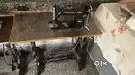 Sewing machine umbrella include motor