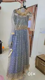 Gown new condition  heavy frill typ