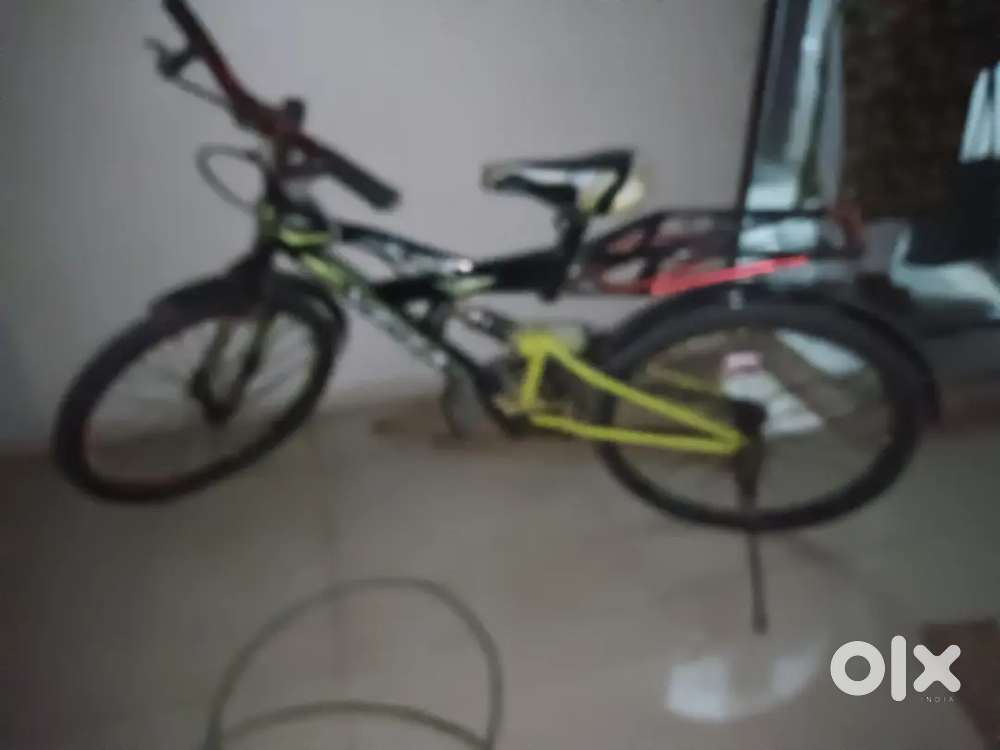 Good condition cycle it has two colour blue and white black and green