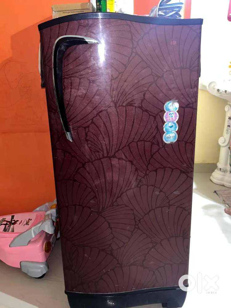 Godrej fridge good condition and table chair for sale